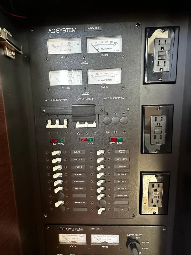 Slide: The Image of Electrical panel of 2016 Tiara Yachts 49 COUPE with AC and DC systems. - 13