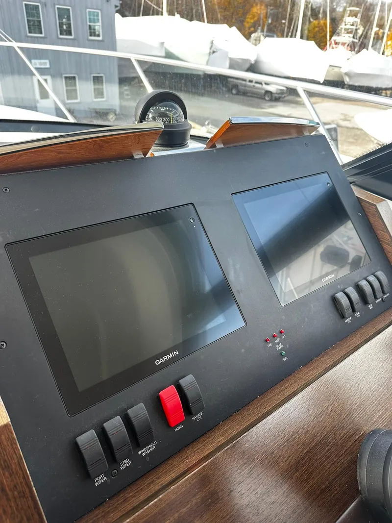 Slide: The Image of Dashboard of 2016 Tiara Yachts 49 COUPE with Garmin displays. - 26