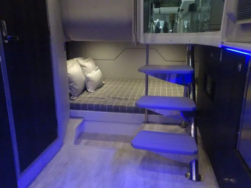 Slide: The Image of 2021 Formula 430 Super Sport Crossover interior with modern design and cozy sleeping area. - 15