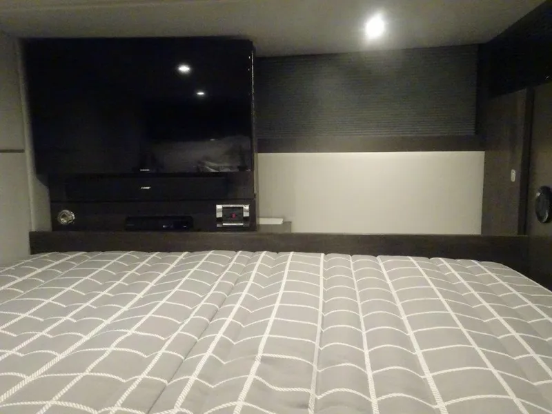 Slide: The Image of Interior of 2021 Formula 430 Super Sport Crossover with bed and entertainment system. - 18