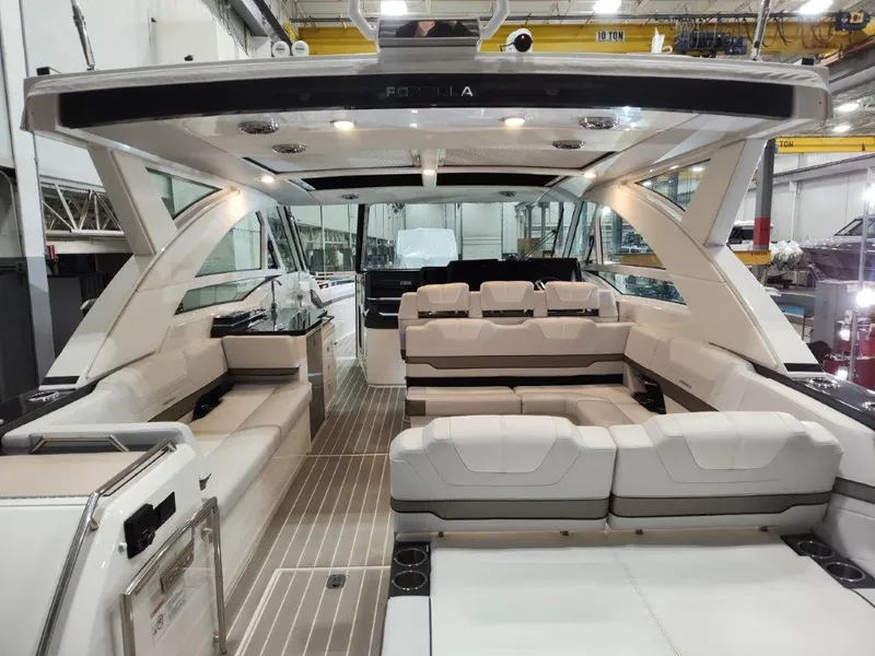 Slide: The Image of 2021 Formula 430 Super Sport Crossover interior with luxurious seating and modern design. - 21