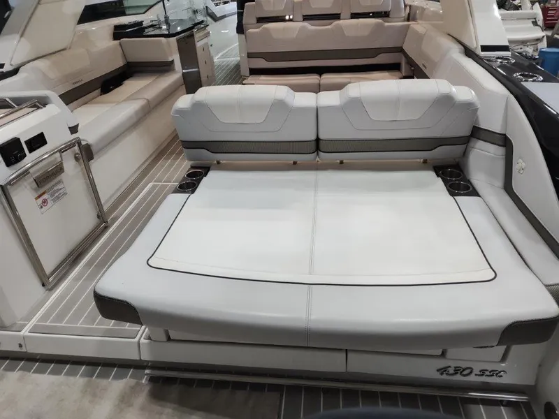 Slide: The Image of 2021 Formula 430 Super Sport Crossover luxury boat interior with spacious seating. - 22