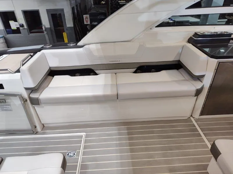 Slide: The Image of 2021 Formula 430 Super Sport Crossover interior with sleek seating and modern design. - 28