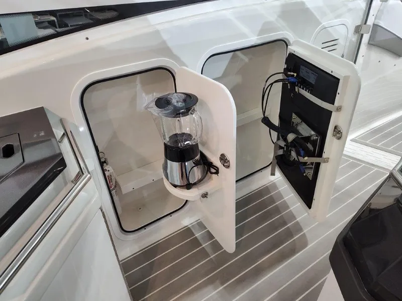 Slide: The Image of 2021 Formula 430 Super Sport Crossover with open storage compartment and blender. - 30
