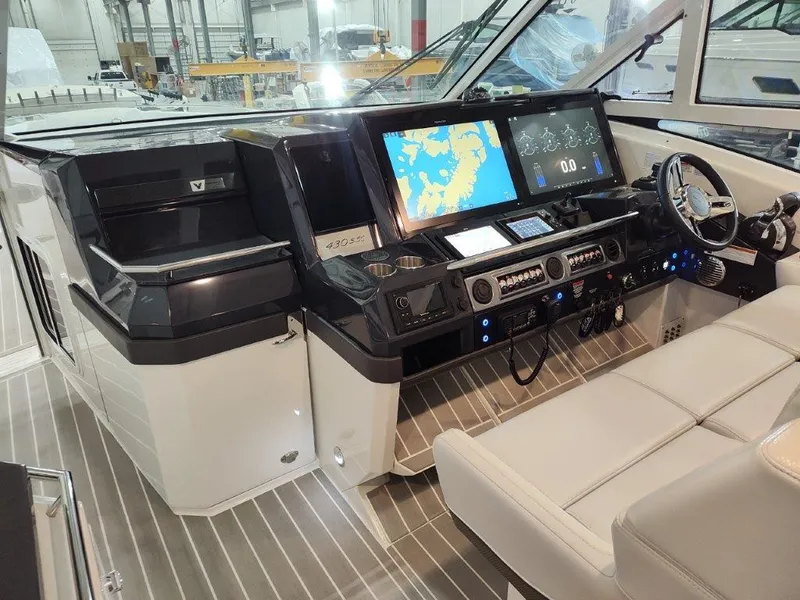 Slide: The Image of 2021 Formula 430 Super Sport Crossover cockpit with advanced navigation system and luxurious seating. - 37