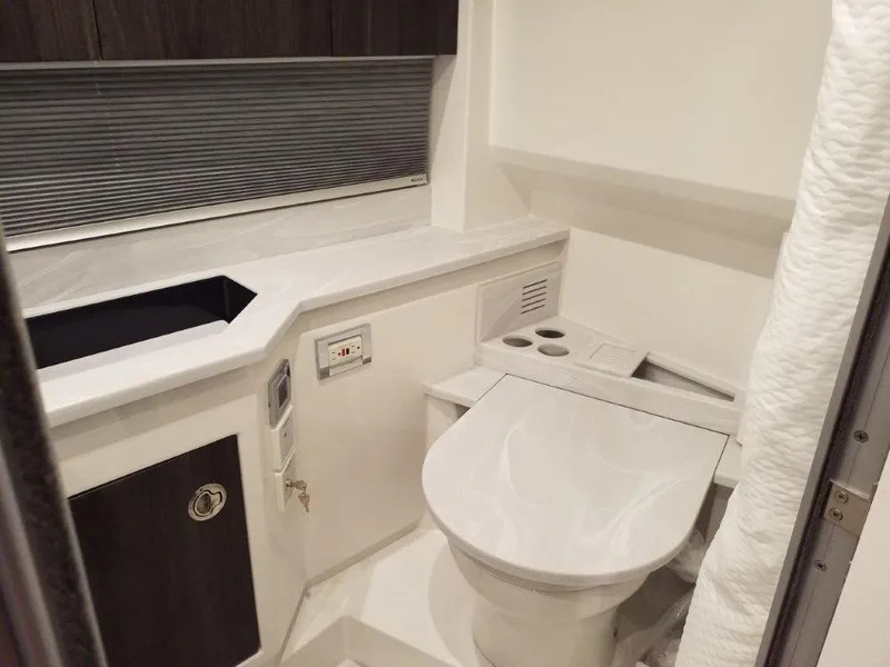 Slide: The Image of 2021 Formula 430 Super Sport Crossover bathroom interior with modern fixtures. - 4