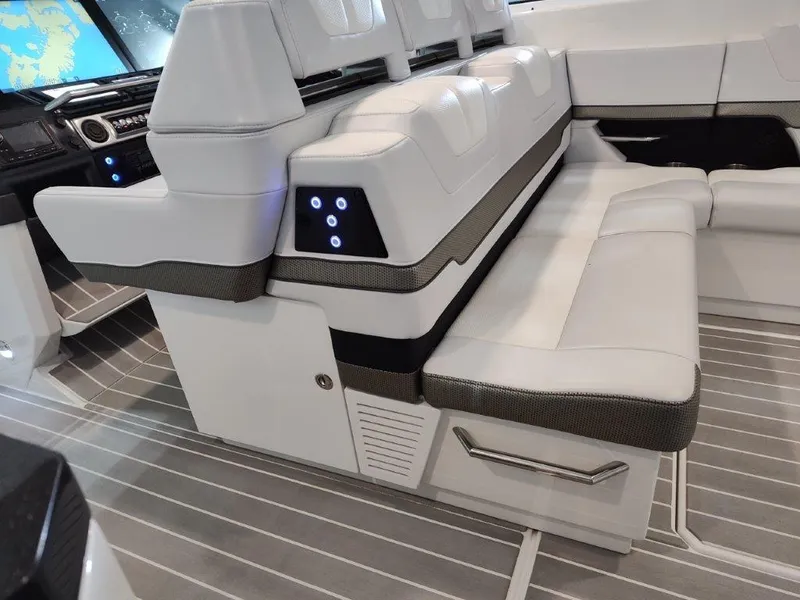 Slide: The Image of Interior seating of 2021 Formula 430 Super Sport Crossover boat, featuring modern design and controls. - 44