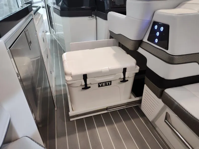 Slide: The Image of 2021 Formula 430 Super Sport Crossover interior with Yeti cooler on slide-out tray. - 45
