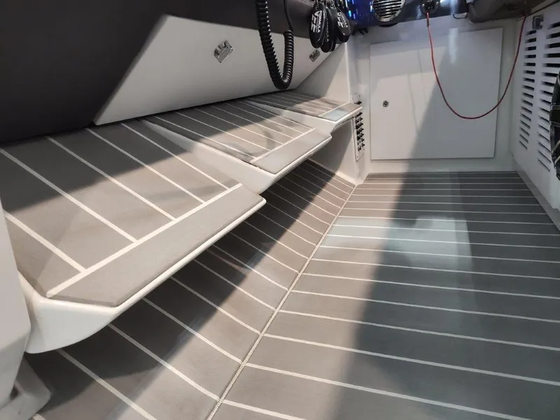 Slide: The Image of 2021 Formula 430 Super Sport Crossover interior with sleek, modern design and striped flooring. - 46