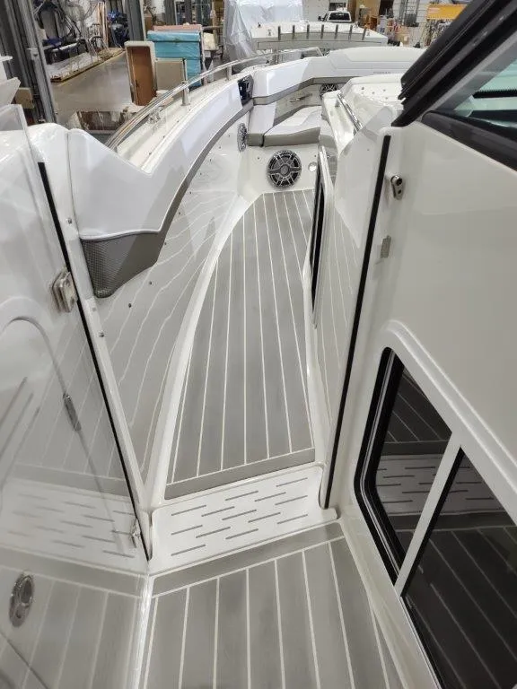 Slide: The Image of 2021 Formula 430 Super Sport Crossover boat deck with sleek design and modern features. - 47
