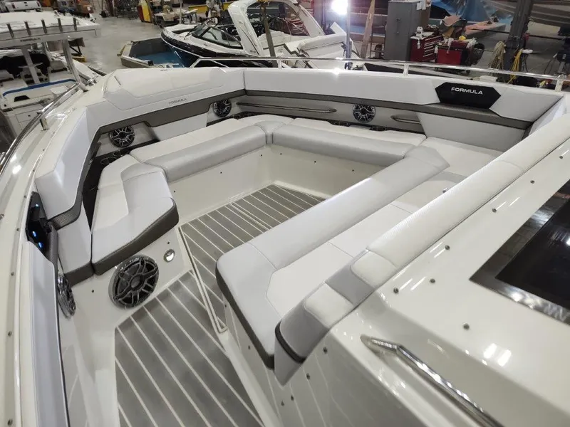 Slide: The Image of 2021 Formula 430 Super Sport Crossover boat interior with luxurious seating and modern design. - 49