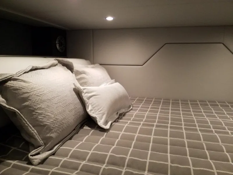 Slide: The Image of Cozy cabin interior of 2021 Formula 430 Super Sport Crossover with plush bedding. - 6