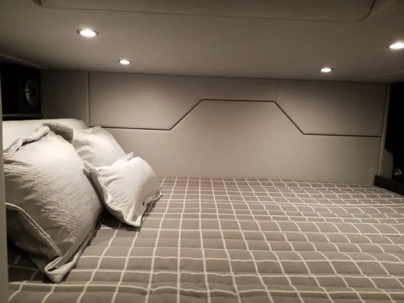 Slide: The Image of Luxurious cabin interior of 2021 Formula 430 Super Sport Crossover with cozy bedding. - 8