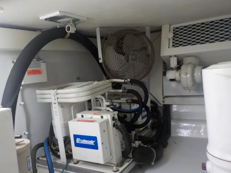 Slide: The Image of Engine room of 1996 Viking 47 Convertible yacht with Cruisair system. - 31