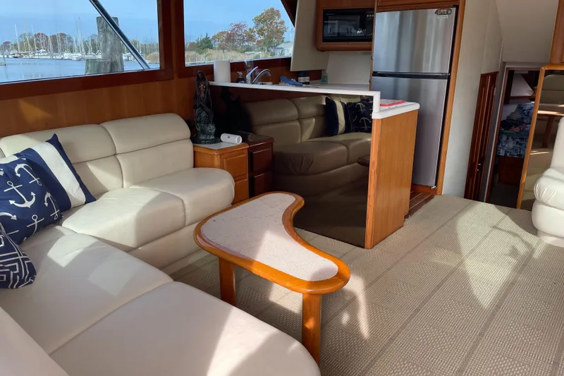 Slide: The Image of Luxurious interior of 1996 Viking 47 Convertible yacht with modern furnishings. - 5