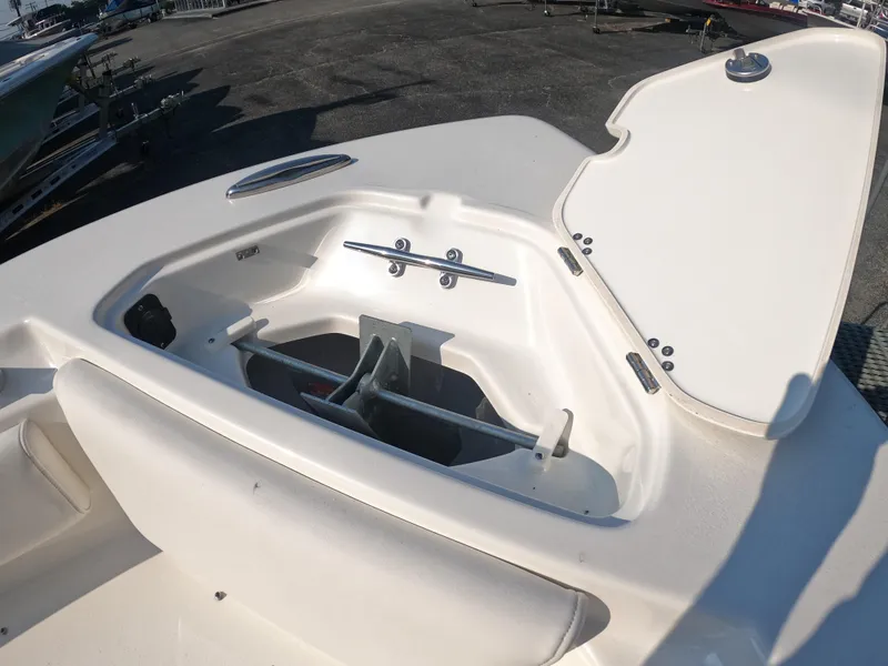 Slide: The Image of 2025 Key West 239 FS boat anchor compartment with open hatch. - 26