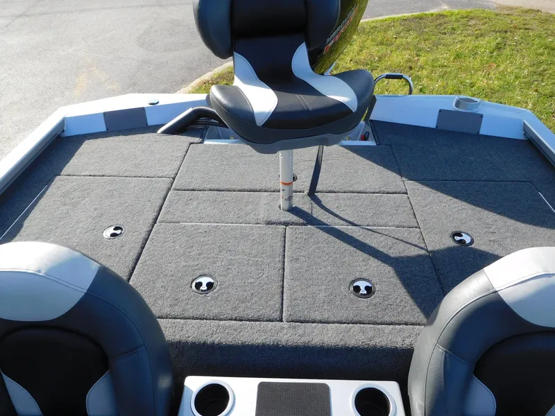 Slide: The Image of 2025 Vexus AVX 1980C boat interior with cushioned seating and storage compartments. - 10