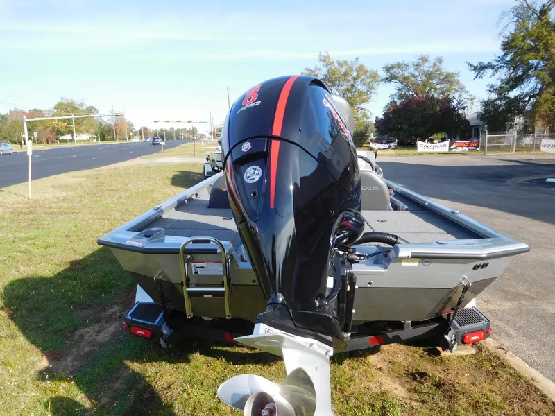 Slide: The Image of 2025 Vexus AVX 1980C boat with powerful outboard motor on trailer. - 12