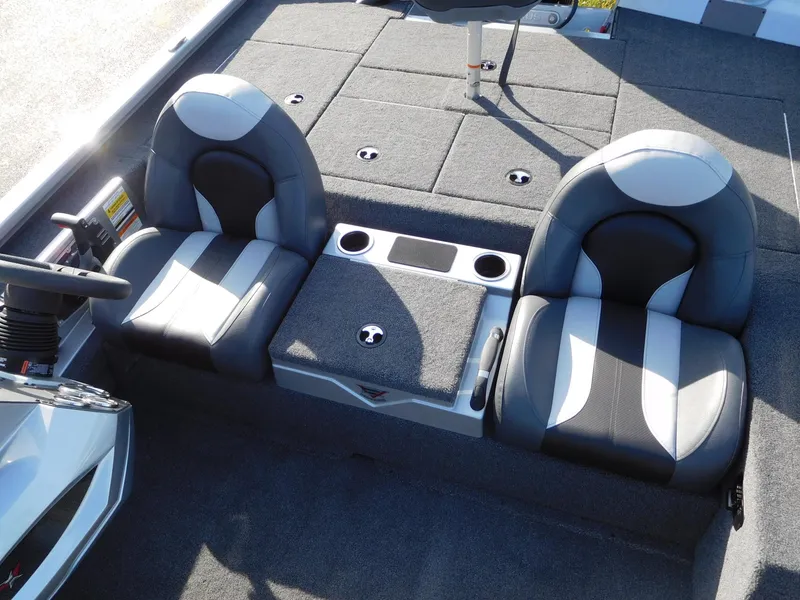 Slide: The Image of 2025 Vexus AVX 1980C boat interior with dual seats and storage compartments. - 3