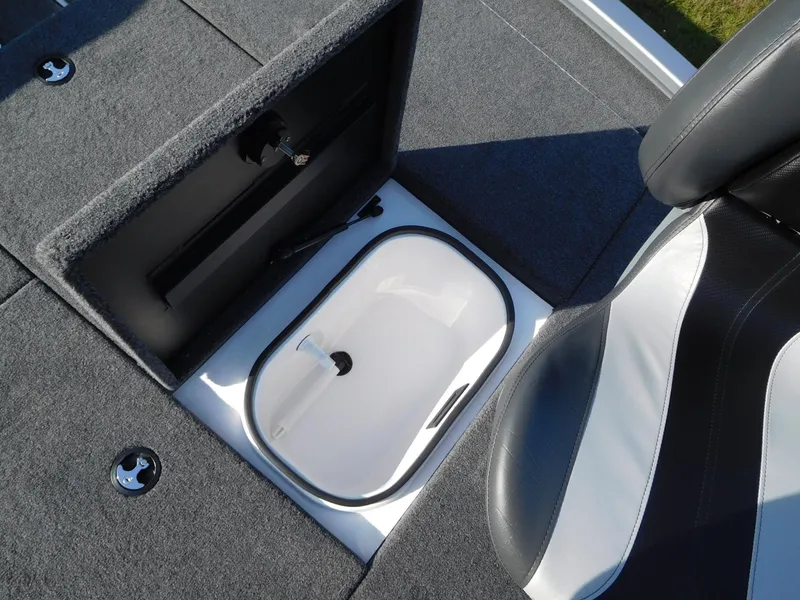 Slide: The Image of 2025 Vexus AVX 1980C boat interior with storage compartment and seating. - 6