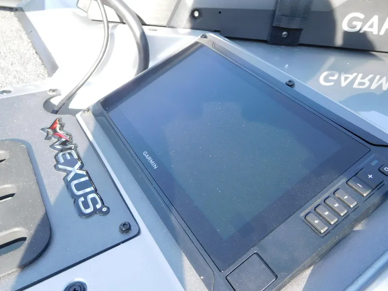 Slide: The Image of 2025 Vexus AVX 1980C boat dashboard with Garmin display. - 7