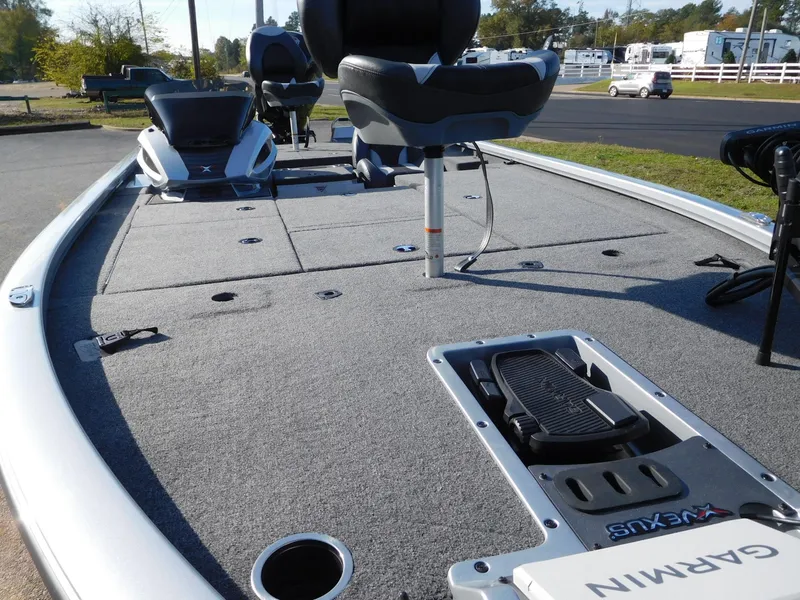 Slide: The Image of 2025 Vexus AVX 1980C boat deck with Garmin equipment, featuring comfortable seating and spacious layout. - 9