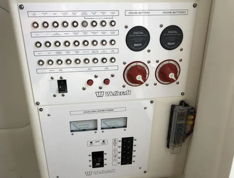 Slide: The Image of Control panel of 2018 Wellcraft 302 Fisherman boat with battery and power switches. - 16