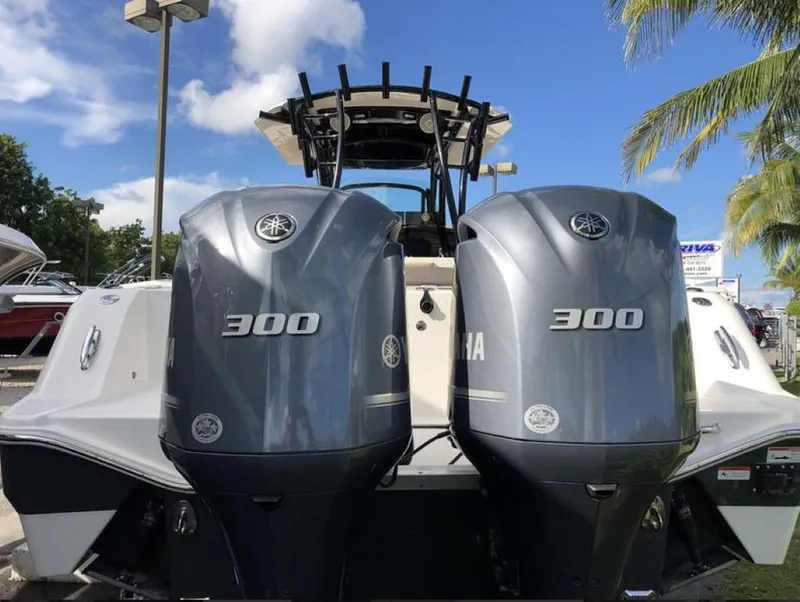 Slide: The Image of 2018 Wellcraft 302 Fisherman with twin Yamaha 300 engines, rear view. - 26