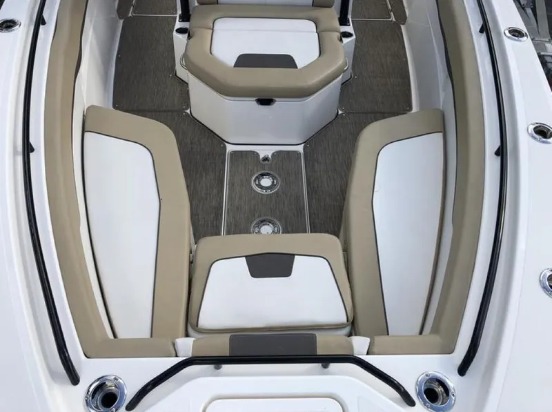 Slide: The Image of 2018 Wellcraft 302 Fisherman boat interior with cushioned seating and sleek design. - 5