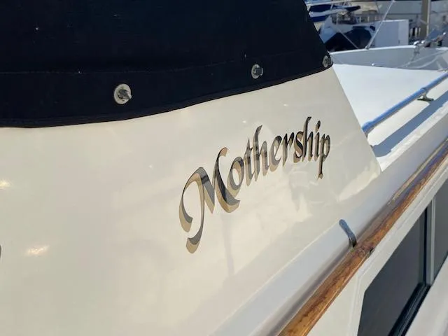 The Image of 1973 Hatteras Motor Yacht with "Mothership" nameplate, close-up view. - 0