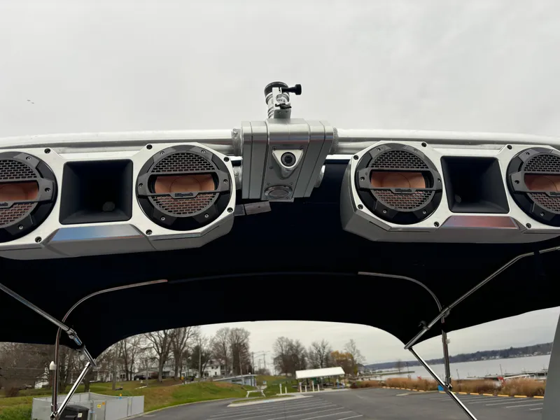 Slide: The Image of MasterCraft XT22 2020 boat speakers and camera on a wakeboard tower. - 6