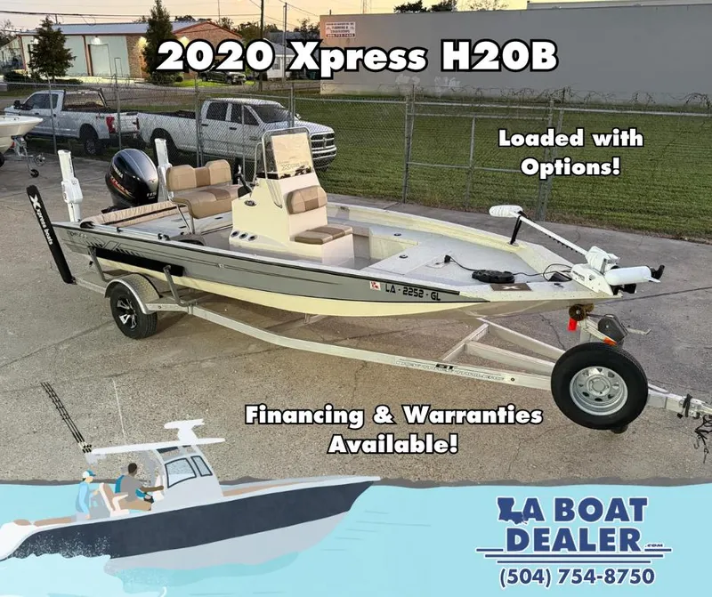 Slide: The Image of 2020 Xpress H20B boat with trailer, loaded with options, financing available at LA Boat Dealer. - 1