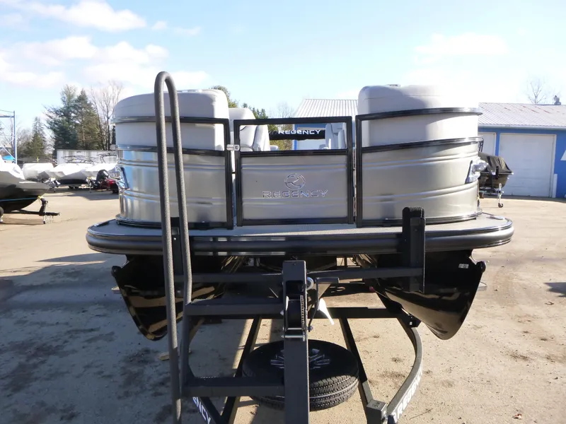 Slide: The Image of 2025 Regency 230 LE3 pontoon boat on trailer, rear view. - 11