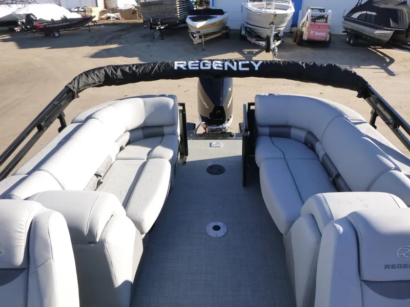 Slide: The Image of 2025 Regency 230 LE3 pontoon boat with spacious seating and sleek design. - 17