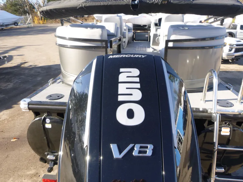 Slide: The Image of 2025 Regency 230 LE3 boat with Mercury 250 V8 engine, rear view. - 5