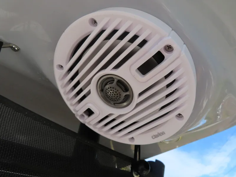 Slide: The Image of Close-up of a Clarion marine speaker on a 2025 Key West 244 Center Console boat. - 15
