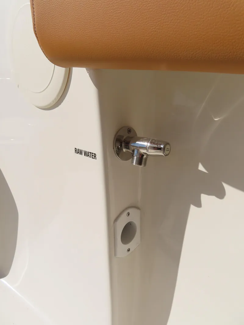 Slide: The Image of 2025 Key West 244 Center Console raw water outlet detail. - 18