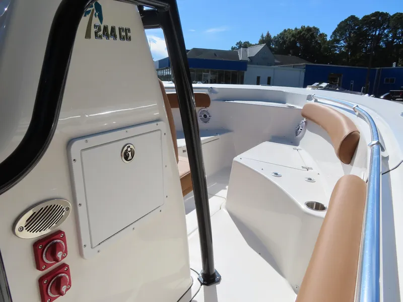 Slide: The Image of 2025 Key West 244 Center Console boat interior with seating and storage compartments. - 20
