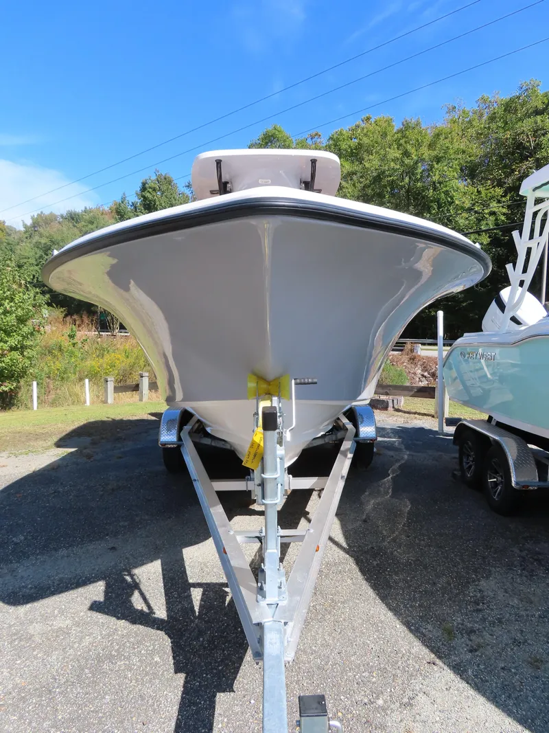 Slide: The Image of 2025 Key West 244 Center Console boat on trailer, front view. - 4