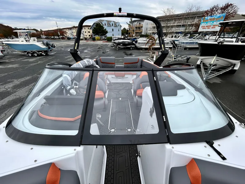 Slide: The Image of 2025 Scarab 255LX boat interior with sleek design and modern features. - 8