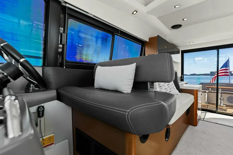 Slide: The Image of Interior of 2014 Prestige 450 S yacht with modern seating and ocean view. - 20