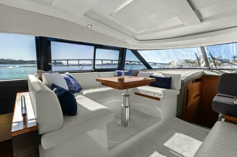 Slide: The Image of Luxurious interior of 2014 Prestige 450 S yacht with elegant seating and panoramic windows. - 23