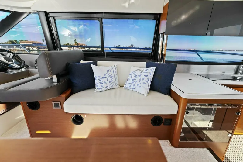 Slide: The Image of Luxurious interior of 2014 Prestige 450 S yacht with comfortable seating and scenic views. - 25