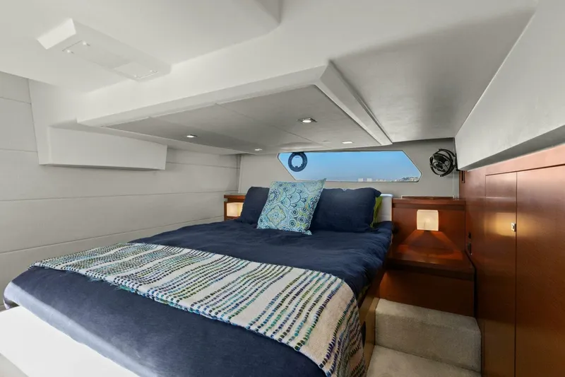 Slide: The Image of Luxurious cabin interior of 2014 Prestige 450 S yacht with cozy bedding. - 32
