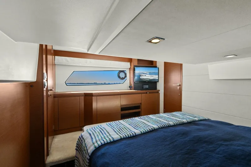 Slide: The Image of Luxurious cabin interior of 2014 Prestige 450 S yacht with modern amenities. - 33