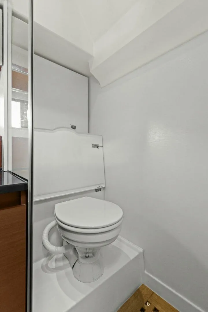 Slide: The Image of Compact bathroom in 2014 Prestige 450 S yacht with white toilet and modern design. - 41