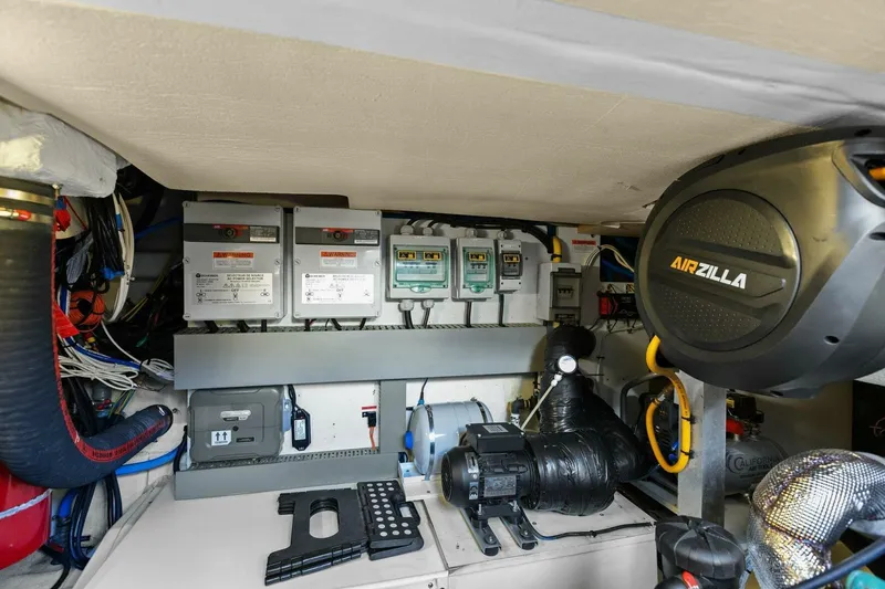 Slide: The Image of Engine room of 2014 Prestige 450 S yacht with electrical panels and equipment. - 47
