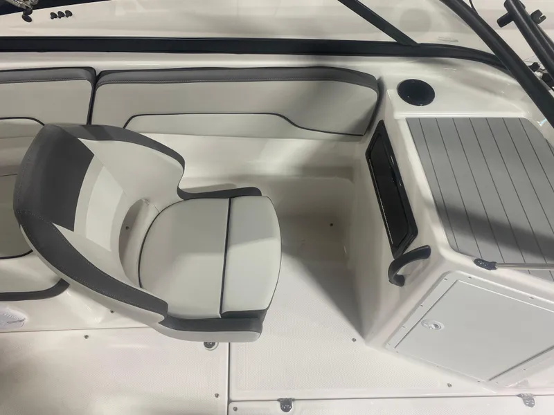 Slide: The Image of 2024 Yamaha Boats SX190 interior with sleek seating and modern dashboard design. - 6