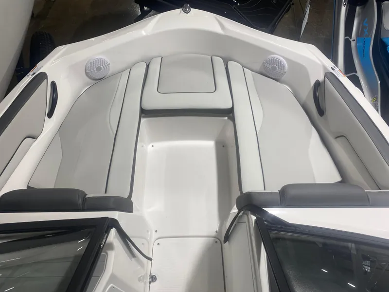 Slide: The Image of 2024 Yamaha Boats SX190 interior with sleek seating and modern design. - 7
