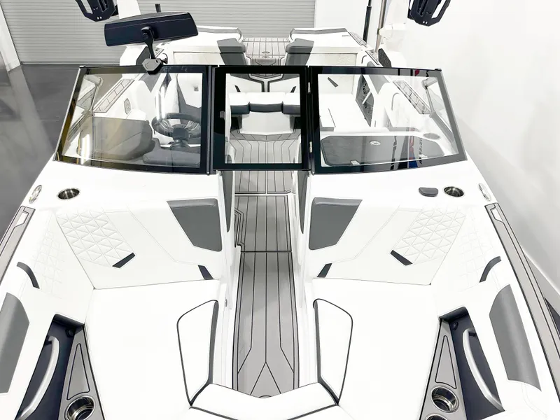 Slide: The Image of 2025 Nautique GS20 boat interior with sleek white and gray design. - 6